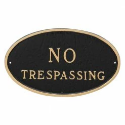 Montague Metal Products 6 in. x 10 in. Small Oval No Trespassing Statement Plaque Sign Black with Gold Lettering