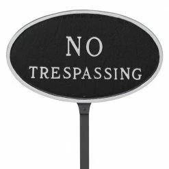Montague Metal Products 6 in. x 10 in. Small Oval No Trespassing Statement Plaque Sign with 23 in. Lawn Stake, Black with Silver Lettering